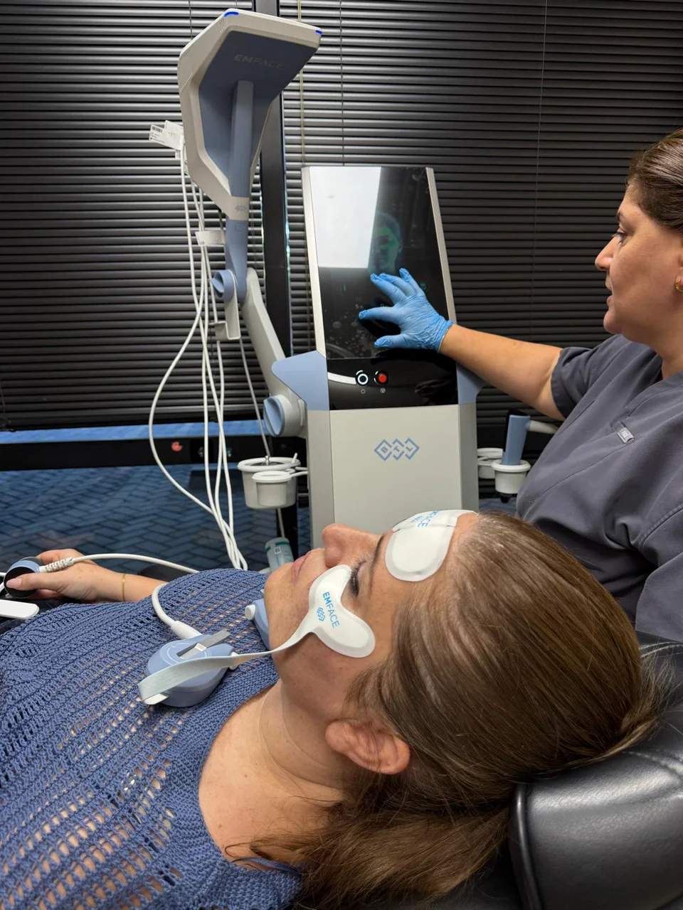 EMFACE equipment being used during a treatment at the practice
